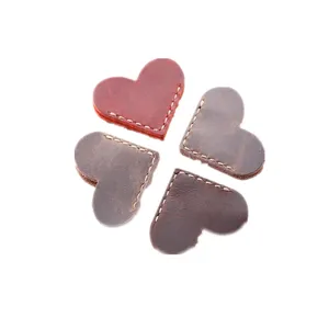 Vintage crazy horse leather heart shaped bookmarks handmade corner page clips for reading lovers.