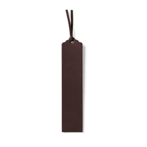 Dark brown PU leather bookmark detail view, showcasing the fine texture and hanging strap.