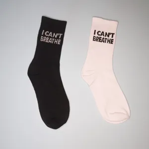 Unisex mid-tube cotton socks with statement text print, comfortable and durable daily wear.
