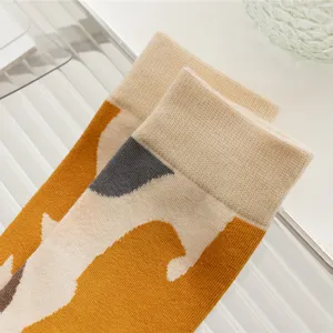 Cute calico cat pattern mid-tube socks, autumn winter cozy cotton socks detail view display.