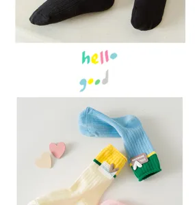 Cute college style color block long socks for women with lovely heart labels and sweet vibes.