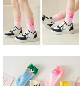 Cute college style women long cotton socks with color block design and sweet heart patches.