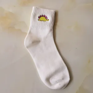Comfortable white cotton mid-calf socks for women featuring cute embroidered dinosaur patterns.