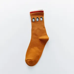 Chaussettes longues femme style Harajuku japonais en coton avec bord tricolore.