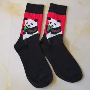 Detail view of cute panda pattern crew socks, casual black red cotton socks, comfortable daily wear.