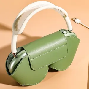 Detail view of the green leather over-ear headphone protective storage case with mesh strap.