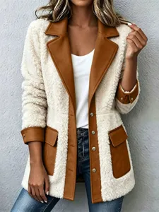 Stijlvolle dames teddy fleece jas met contrasterende revers en zakken voor het koude seizoen.