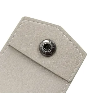 Premium PU leather wireless earphone case detail featuring secure metal snap and stitching.