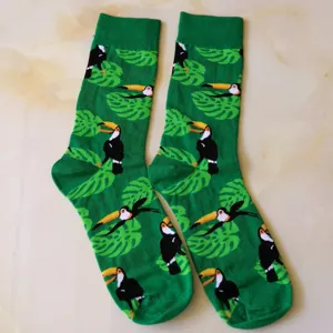 Green tropical toucan print mid-calf casual cotton socks for daily wear and fashion.