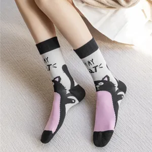 Cute black cat pattern mid tube socks, cozy cotton knit casual wear detailed view.