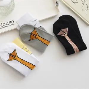 Close-up detail of funny animal duck feet printed mid-tube socks, cute creative winter sock design.