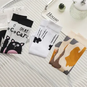 Cute cat and abstract pattern mid-calf crew socks for women and men, autumn and winter.