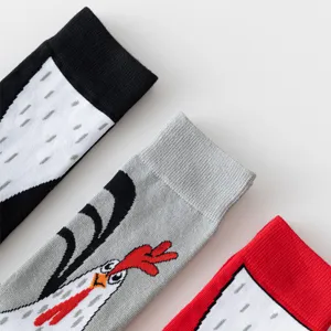 Close-up detail of funny chicken claw pattern mid-calf socks, comfortable autumn winter daily wear.