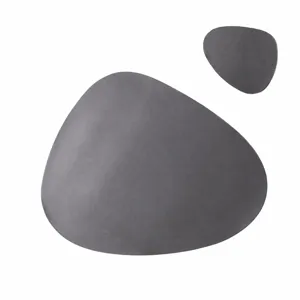 Close-up detail of the irregular dark grey dining placemat and coaster set, heat resistant.