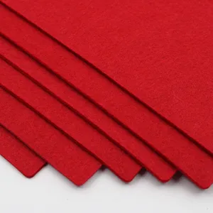Red square felt placemat close up texture, heat resistant non slip table mat for dining.