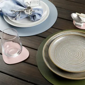 Round PU leather placemat waterproof oil-proof heat-insulation dining table mat pad set.