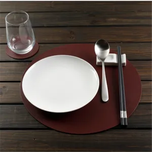 Round PU leather placemat and coaster detail shot, waterproof, oil-proof heat insulation.