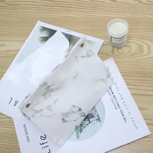 Stijlvolle lederen zakdoekhouder met marmeren patroon, desktop papierhouder voor thuisgebruik.