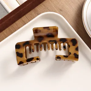 Brown leopard print square hair claw clip, matte PC material, size 10.5x4.5x6cm, stylish design.