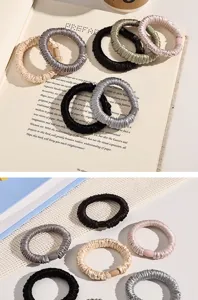 Pleated satin hair scrunchies elastic bands detail view, soft minimalist daily hair accessories.