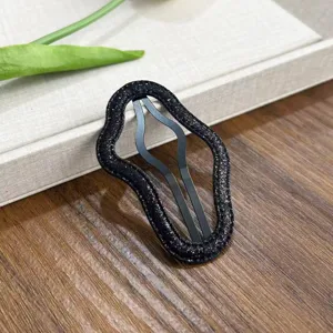Pinza para el pelo negra con purpurina irregular para mujer, accesorio de flequillo chic.