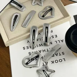 Silver leather hair clips set, shiny geometric heart star snap hairpins for girls bangs styling.