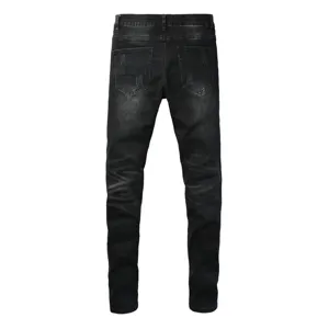 Men's black ripped denim jeans, slim fit casual washed trousers with back pocket distress details.