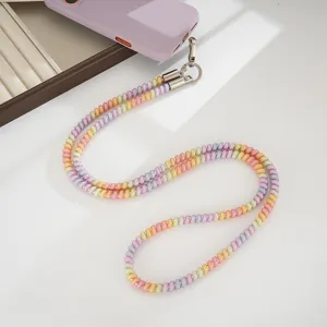 Colorful TPU coiled telephone wire phone strap and cross body lanyard detail view