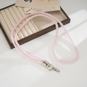 Pink spiral phone lanyard crossbody strap, durable TPU anti-loss rope for outdoor daily use.