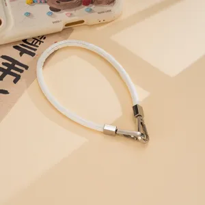 White PU leather wrist strap for phone charm, stylish double metal buckle lanyard accessory.
