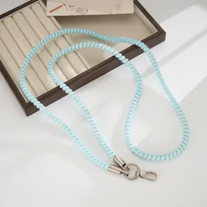 Colorful TPU telephone wire phone lanyard, glitter blue crossbody phone chain for outdoor use.