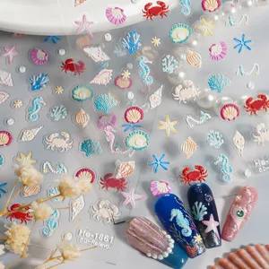 Detail view of 5D relief ocean nail stickers featuring cute shells, starfish, and sea creatures.