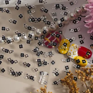 5D embossed silver small wild flower nail art sticker detail view, elegant DIY manicure design.