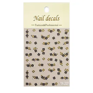 Detailed close-up view of 5d embossed black and gold floral nail art stickers.
