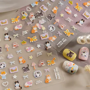 5D embossed cute cat nail stickers set with bows and stars for lovely manicure designs.
