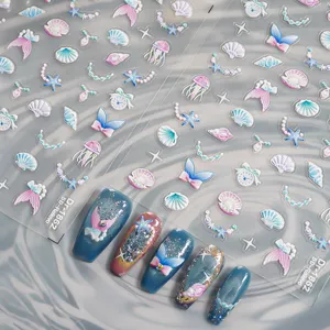 Detail shot of 5D embossed ocean nail stickers featuring cute shells, starfish, and jellyfish.