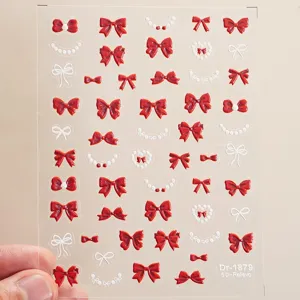 5D embossed rode strik en witte parel nail art sticker vel voor creatieve DIY manicure.