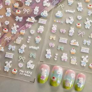 5D embossed cute rabbit and bow nail stickers, trendy cartoon nail art decals for DIY use.