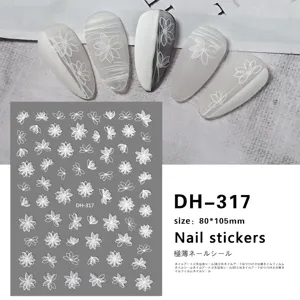 Detailed view of 3D white floral nail stickers, showcasing intricate lotus designs and size.