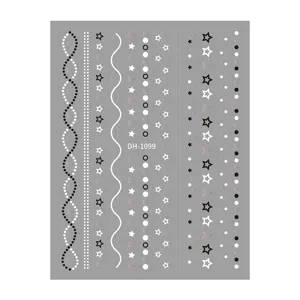 3D nail art stickers sheet with black white dots stripes and star patterns for manicure.
