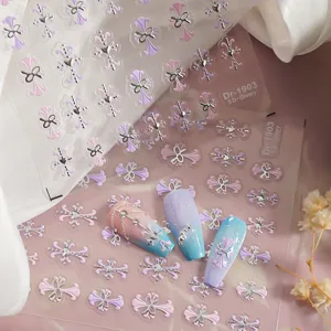 Adesivi per unghie in folio d'argento goffrato 5D con croci gotiche e fiocchi per nail art.