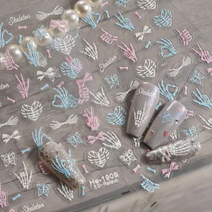 Adesivi per unghie 5D in rilievo con scheletro, farfalle e fiocchi per una manicure unica.