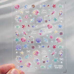 Autocollants d'ongles de l'océan gaufrés 5D avec des coquillages, étoiles de mer et perles.