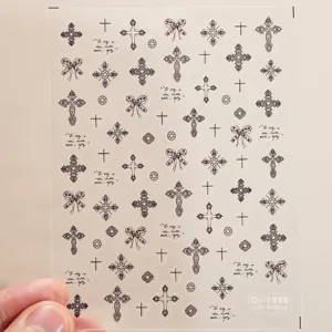 5d relief nail sticker detail showing gothic cross and bow design patterns closeup view