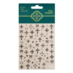 5D embossed nail art stickers featuring elegant cross and bow design for DIY manicure decor.