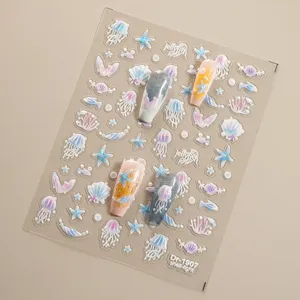 Autocollants d'ongles en relief 5D effet coquillage avec motifs de meduses et etoiles de mer.