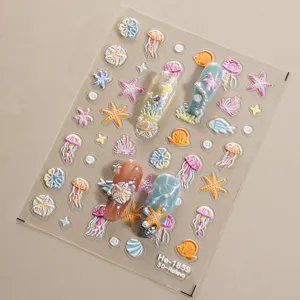 Detail view of 5D embossed ocean nail stickers featuring jellyfish and starfish elements.