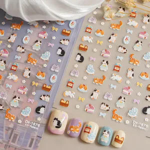 Detail view of 5d embossed cute cat nail stickers featuring various lovely cartoon designs.