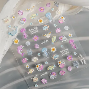 5D embossed nail art sticker featuring cute marine life like jellyfish and dolphins. Detailed.