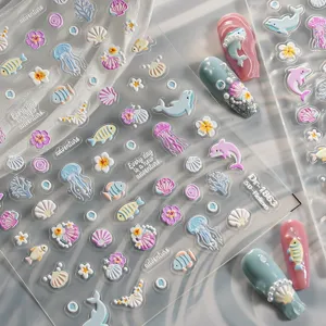 5D embossed ocean nail stickers featuring cute dolphins and jellyfish for detailed manicures.
